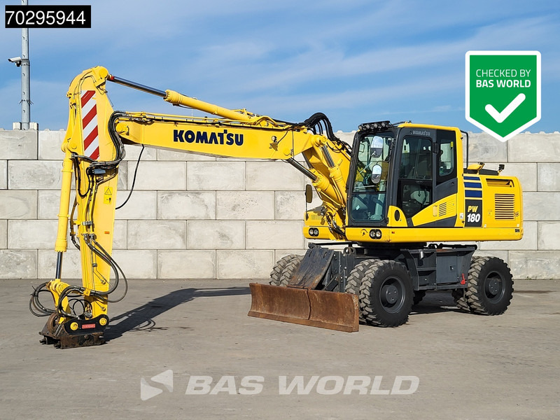 Komatsu PW180 -11 - Tekerlekli ekskavatör: fotoğraf 1 Komatsu PW180 -11 - Tekerlekli ekskavatör: fotoğraf 1