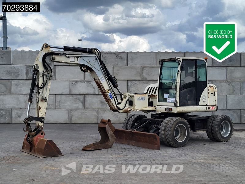 Terex TW85 - Tekerlekli ekskavatör: fotoğraf 1 Terex TW85 - Tekerlekli ekskavatör: fotoğraf 1