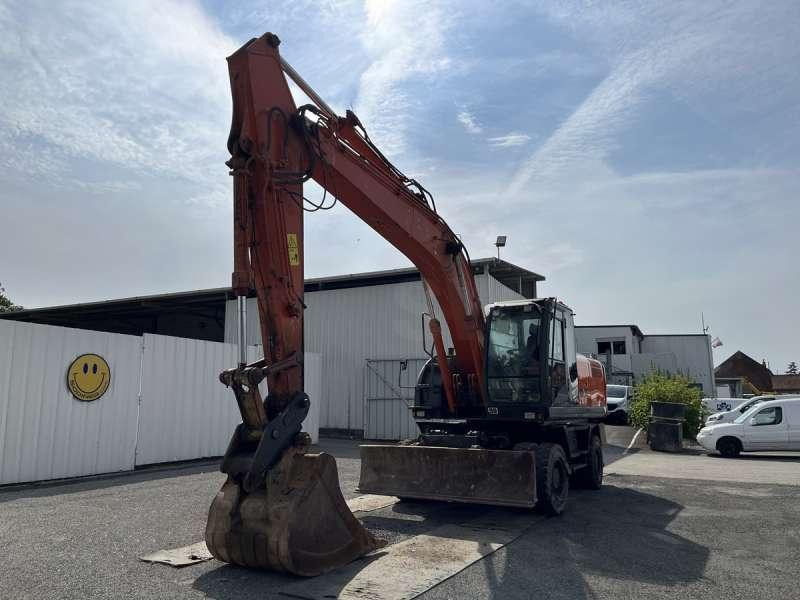 Hitachi ZX210W-3 - Tekerlekli ekskavatör: fotoğraf 2 Hitachi ZX210W-3 - Tekerlekli ekskavatör: fotoğraf 2
