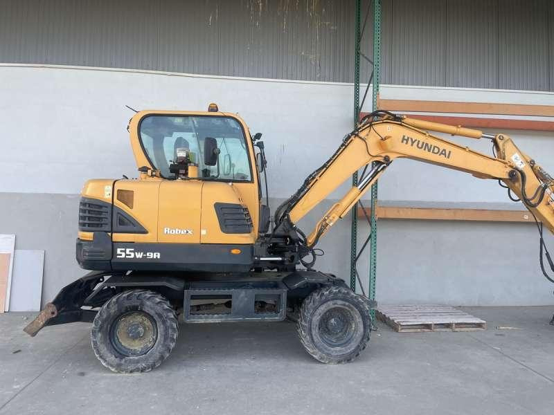 Hyundai R55W-9A - Tekerlekli ekskavatör: fotoğraf 1 Hyundai R55W-9A - Tekerlekli ekskavatör: fotoğraf 1