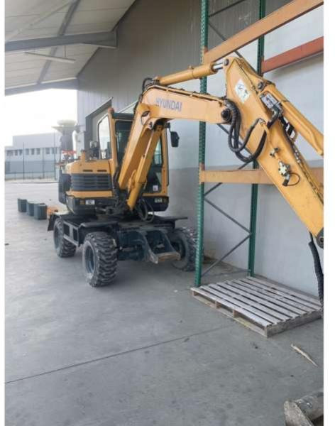 Hyundai R55W-9A - Tekerlekli ekskavatör: fotoğraf 2 Hyundai R55W-9A - Tekerlekli ekskavatör: fotoğraf 2