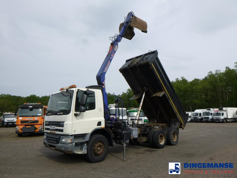 DAF CF 75.310 6x4 RHD tipper + HMF 1144 K-1 + grapple - Vinçli kamyon: fotoğraf 1 DAF CF 75.310 6x4 RHD tipper + HMF 1144 K-1 + grapple - Vinçli kamyon: fotoğraf 1