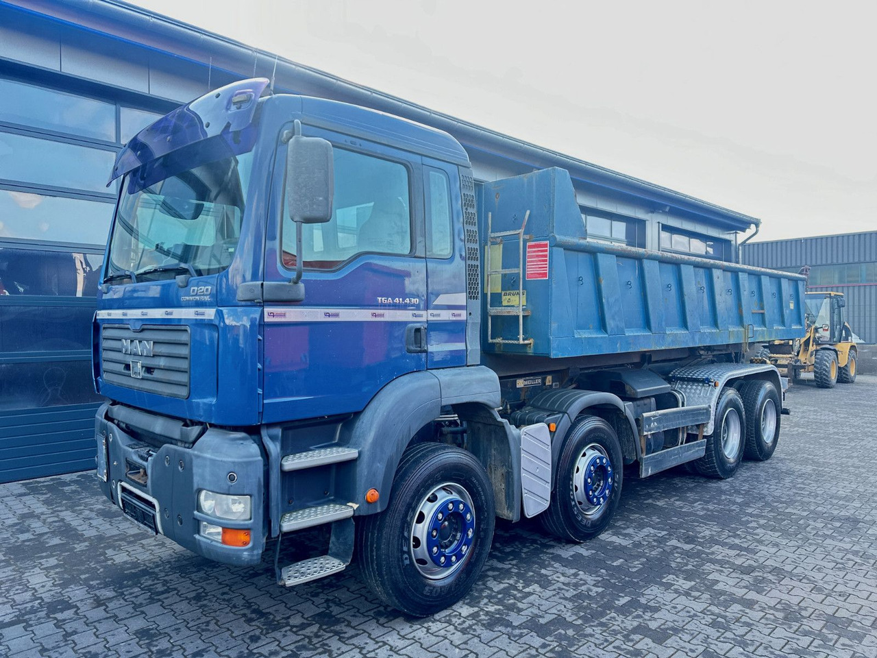 MAN TGA 41.430 8x4 Abrollkipper + Meiller Aufbau - Kancalı yükleyici kamyon: fotoğraf 2 MAN TGA 41.430 8x4 Abrollkipper + Meiller Aufbau - Kancalı yükleyici kamyon: fotoğraf 2