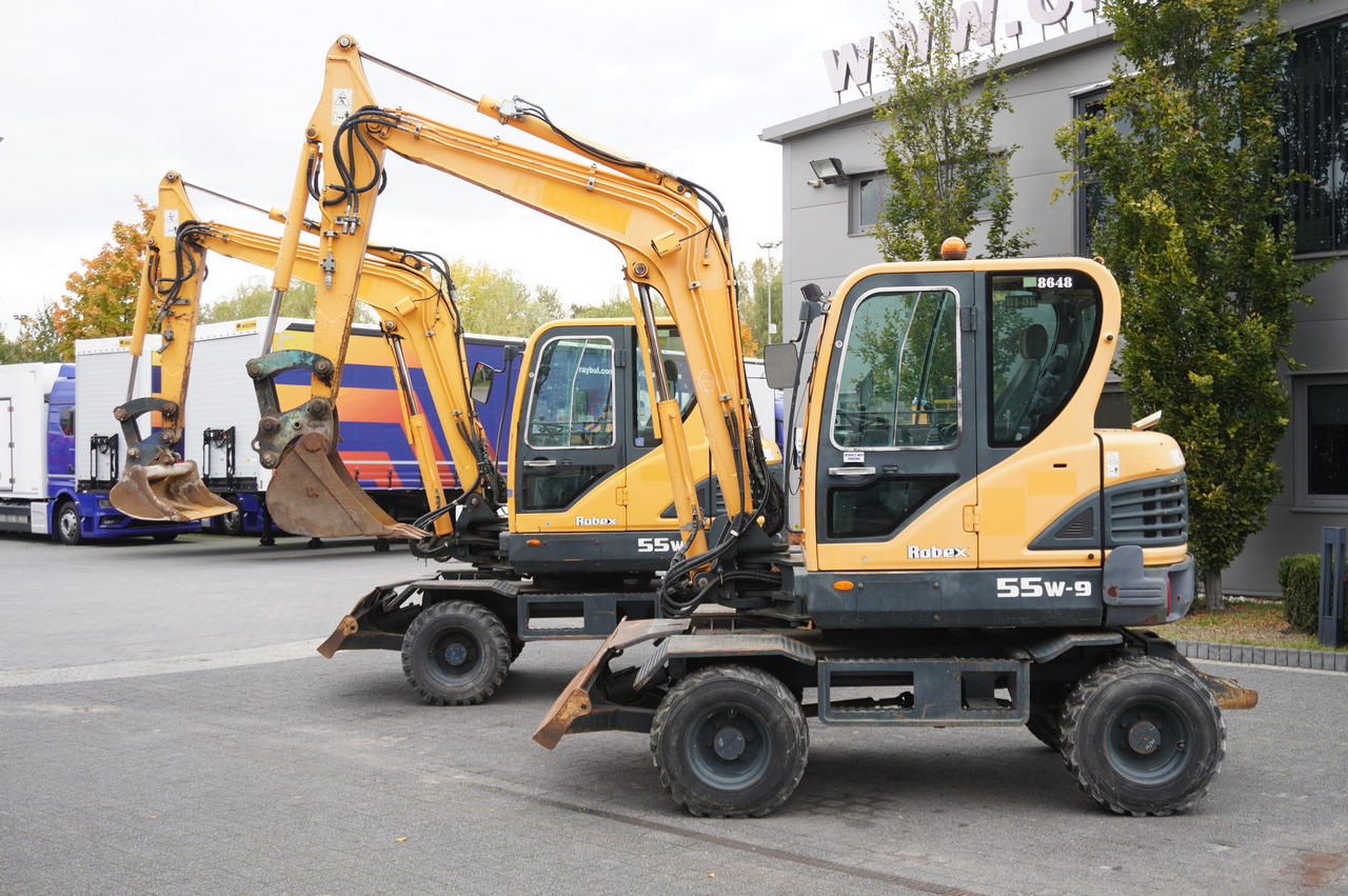 Hyundai Robex 55W-9 Wheeled Excavator 5.5t / 2pcs - Mini ekskavatör: fotoğraf 1 Hyundai Robex 55W-9 Wheeled Excavator 5.5t / 2pcs - Mini ekskavatör: fotoğraf 1