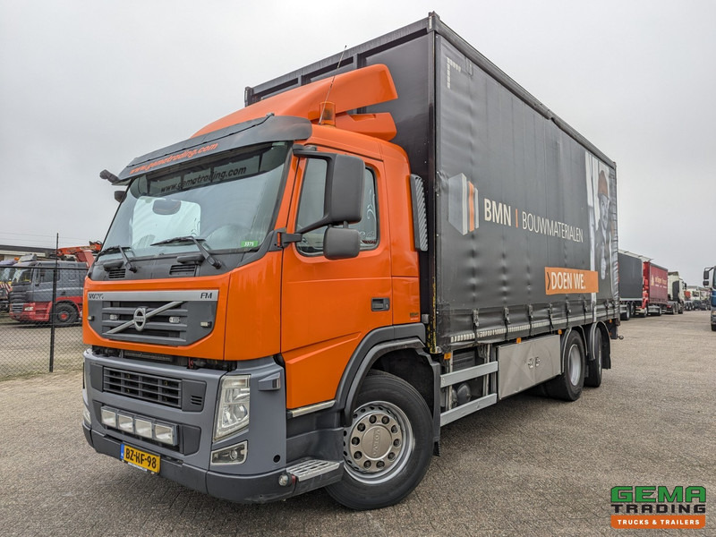 Volvo FM330 6x2/4 Daycab Euro5 EEV - SchuifzeilenBak 6.7m. - KooiAap Aansluiting - HH Vloer - Rongen - Tenteli kamyon: fotoğraf 1 Volvo FM330 6x2/4 Daycab Euro5 EEV - SchuifzeilenBak 6.7m. - KooiAap Aansluiting - HH Vloer - Rongen - Tenteli kamyon: fotoğraf 1
