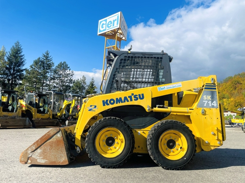 Komatsu SK714 (4077) - Mini yükleyici: fotoğraf 1 Komatsu SK714 (4077) - Mini yükleyici: fotoğraf 1