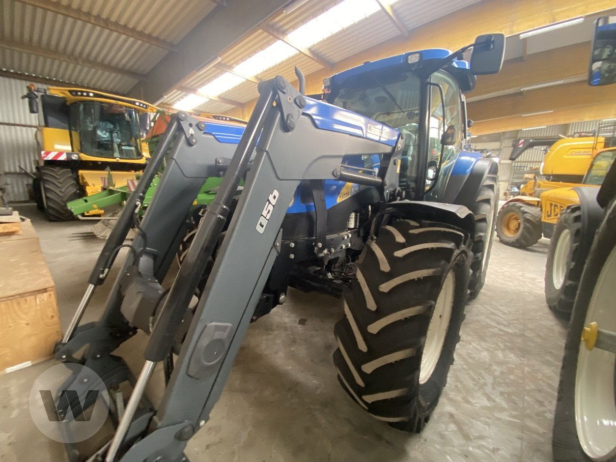 New Holland T6020 Elite - Traktör: fotoğraf 1 New Holland T6020 Elite - Traktör: fotoğraf 1
