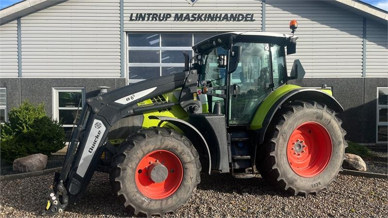 Claas ARION 650 CIS+ Focus med frontlift og frontlæsser - Traktör: fotoğraf 1 Claas ARION 650 CIS+ Focus med frontlift og frontlæsser - Traktör: fotoğraf 1