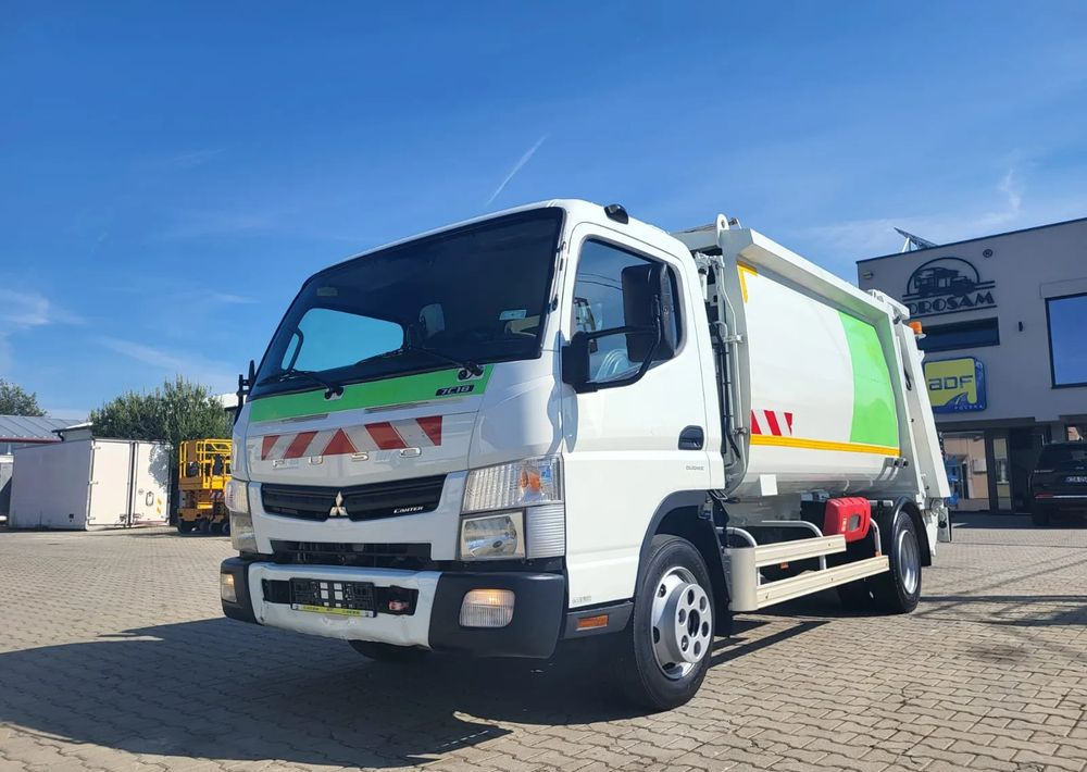 Mitsubishi Fuso Canter - Çöp kamyonu: fotoğraf 1 Mitsubishi Fuso Canter - Çöp kamyonu: fotoğraf 1