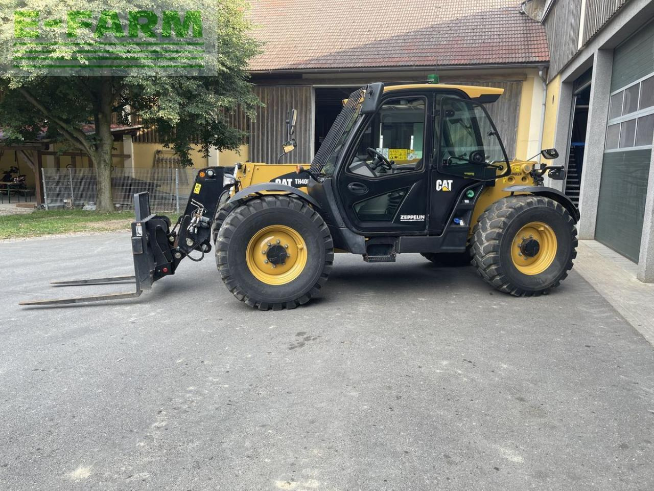 Caterpillar th408d - Teleskopik yükleyici: fotoğraf 1 Caterpillar th408d - Teleskopik yükleyici: fotoğraf 1