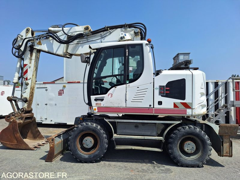 Pelle à pneu LIEBHERR A918 Compact - 2012 / 8153 HEURES - Ekskavatör: fotoğraf 1 Pelle à pneu LIEBHERR A918 Compact - 2012 / 8153 HEURES - Ekskavatör: fotoğraf 1