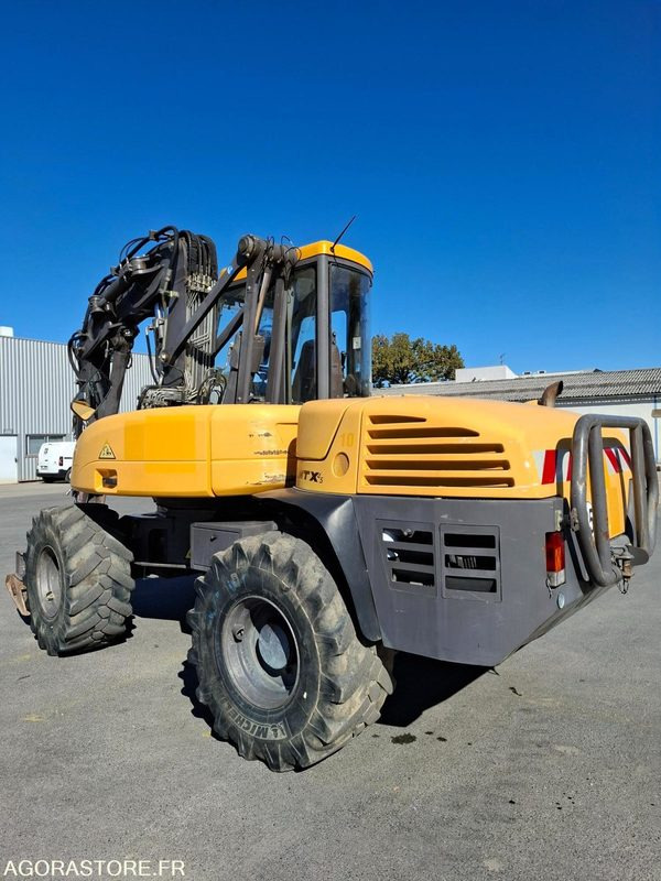 Pelle sur pneus MECALAC 12MTX - N° série 42770 - 2014 - 11400 heures - Ekskavatör: fotoğraf 3 Pelle sur pneus MECALAC 12MTX - N° série 42770 - 2014 - 11400 heures - Ekskavatör: fotoğraf 3