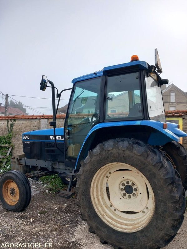 TRACTEUR NEW HOLLAND - Traktör: fotoğraf 1 TRACTEUR NEW HOLLAND - Traktör: fotoğraf 1