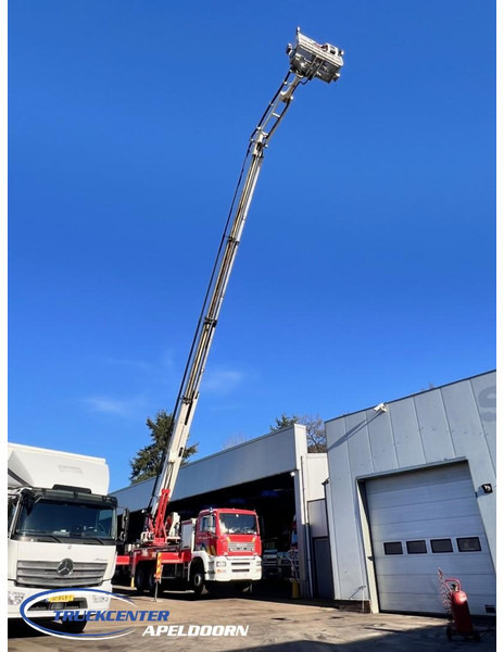 MAN TGA 26.350 Magirus ALP 320L = 32 meter, Waterpump, 6x4, Steel springs - Kamyon: fotoğraf 1 MAN TGA 26.350 Magirus ALP 320L = 32 meter, Waterpump, 6x4, Steel springs - Kamyon: fotoğraf 1
