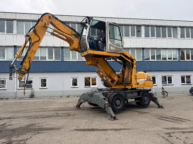 Liebherr A 316 LITRONIC CABIN HIGH CE - Elleçleme makinesi: fotoğraf 1 Liebherr A 316 LITRONIC CABIN HIGH CE - Elleçleme makinesi: fotoğraf 1