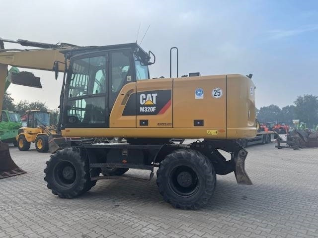 CAT M 320 F - Tekerlekli ekskavatör: fotoğraf 3 CAT M 320 F - Tekerlekli ekskavatör: fotoğraf 3