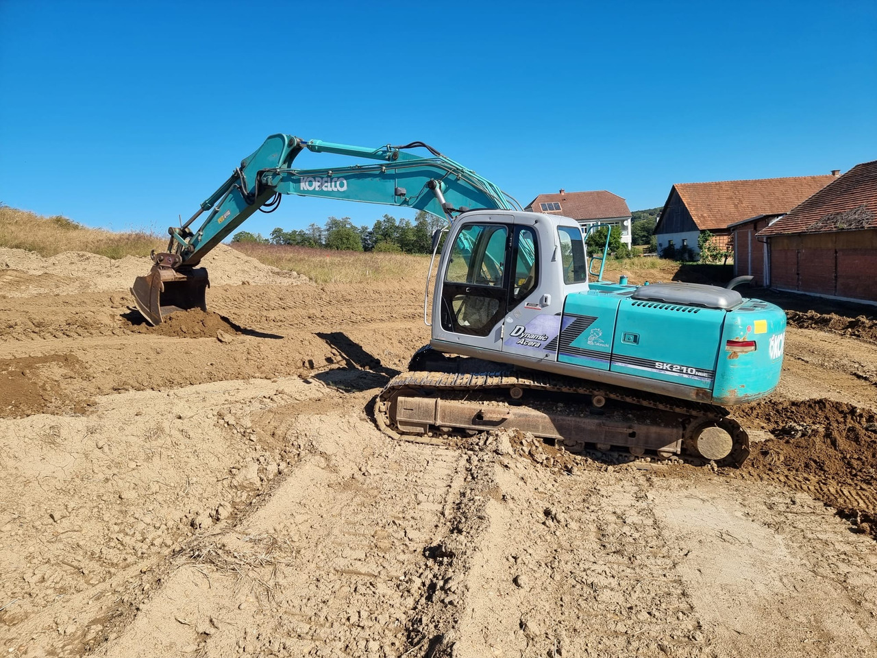 KOBELCO SK 210 NLC-6E - Paletli ekskavatör: fotoğraf 1 KOBELCO SK 210 NLC-6E - Paletli ekskavatör: fotoğraf 1