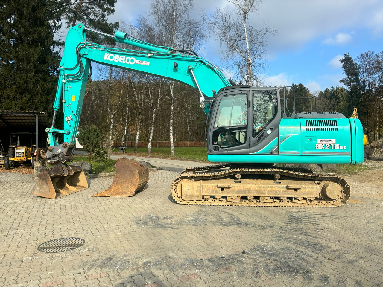Kobelco SK 210 NLC-9 - Paletli ekskavatör: fotoğraf 1 Kobelco SK 210 NLC-9 - Paletli ekskavatör: fotoğraf 1