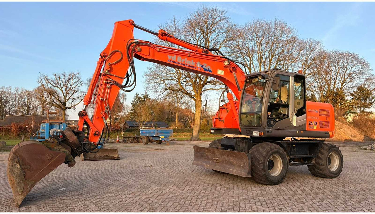 2009 HITACHI ZX140W-3 WHEELED EXCAVATOR - Tekerlekli ekskavatör: fotoğraf 1 2009 HITACHI ZX140W-3 WHEELED EXCAVATOR - Tekerlekli ekskavatör: fotoğraf 1