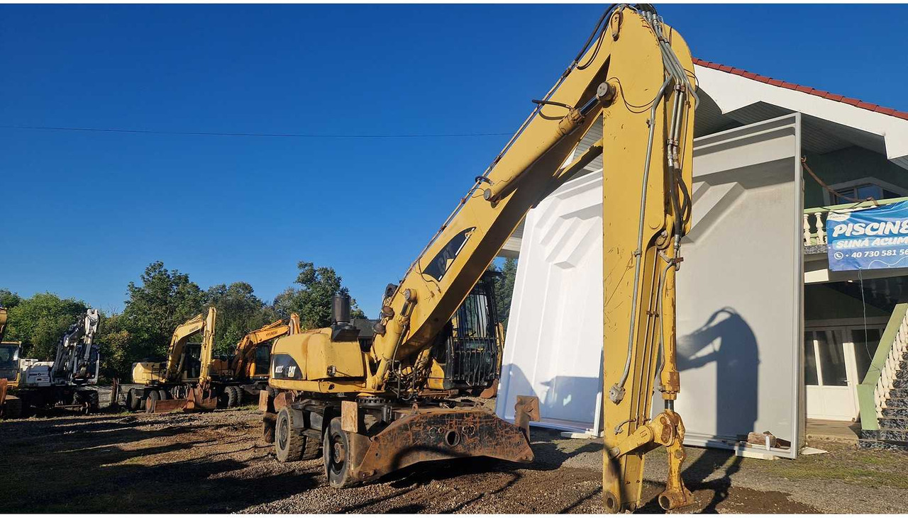 Caterpillar M322C - Tekerlekli ekskavatör: fotoğraf 4 Caterpillar M322C - Tekerlekli ekskavatör: fotoğraf 4