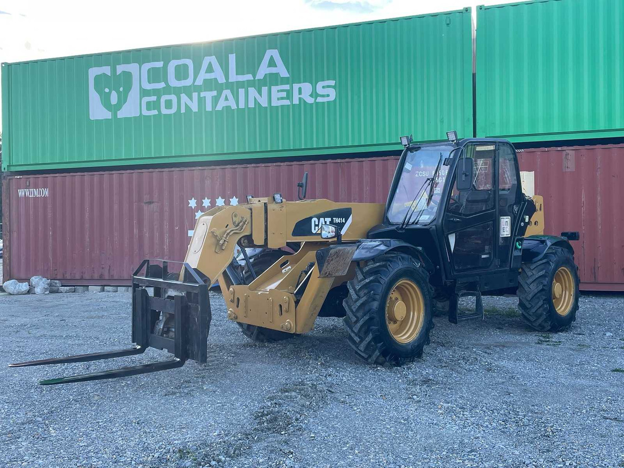 Caterpillar TH414 - Tekerlekli yükleyici: fotoğraf 4 Caterpillar TH414 - Tekerlekli yükleyici: fotoğraf 4