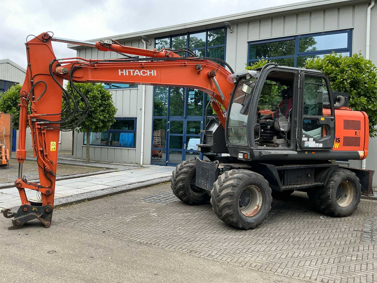Hitachi ZX140W-3 - Tekerlekli ekskavatör: fotoğraf 1 Hitachi ZX140W-3 - Tekerlekli ekskavatör: fotoğraf 1