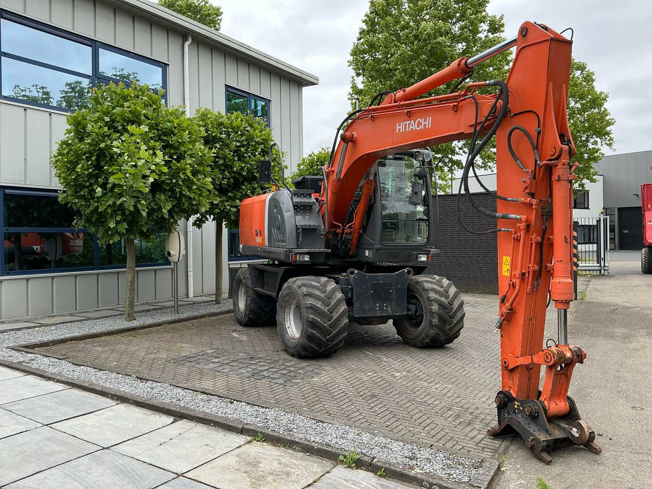 Hitachi ZX140W-3 - Tekerlekli ekskavatör: fotoğraf 3 Hitachi ZX140W-3 - Tekerlekli ekskavatör: fotoğraf 3