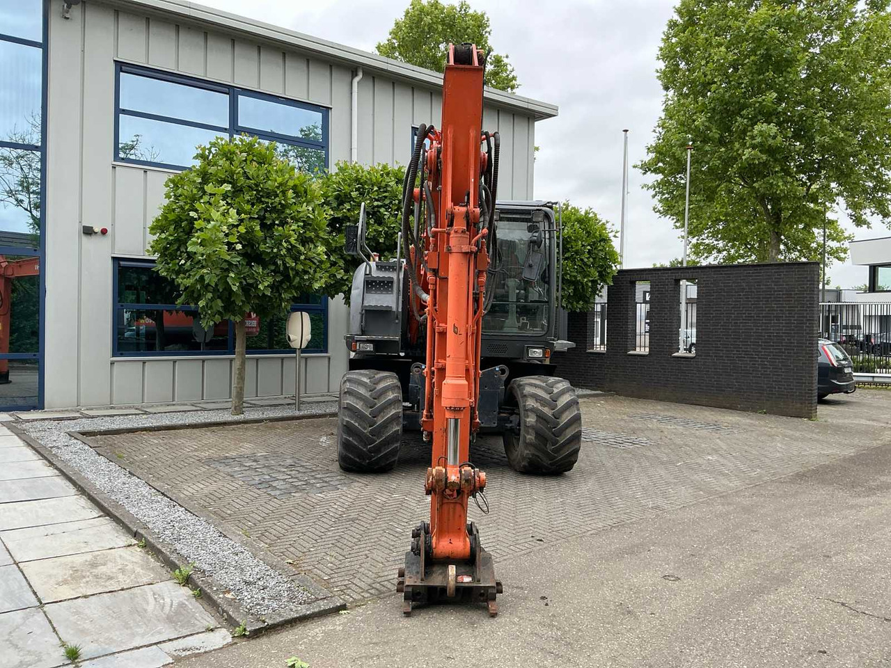 Hitachi ZX140W-3 - Tekerlekli ekskavatör: fotoğraf 2 Hitachi ZX140W-3 - Tekerlekli ekskavatör: fotoğraf 2
