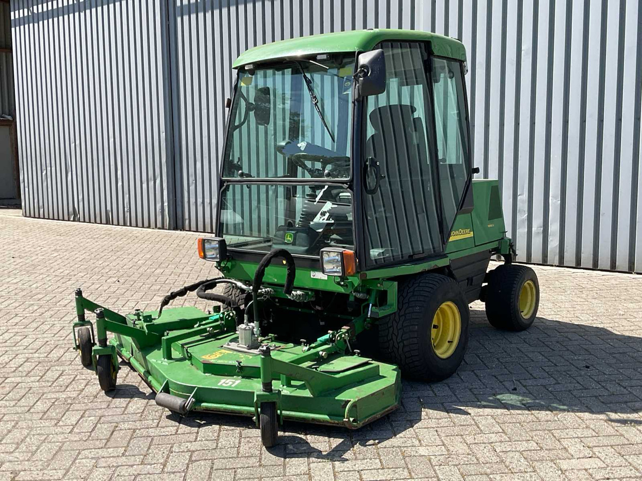 John Deere 1505 - Çim biçme makinesi: fotoğraf 1 John Deere 1505 - Çim biçme makinesi: fotoğraf 1