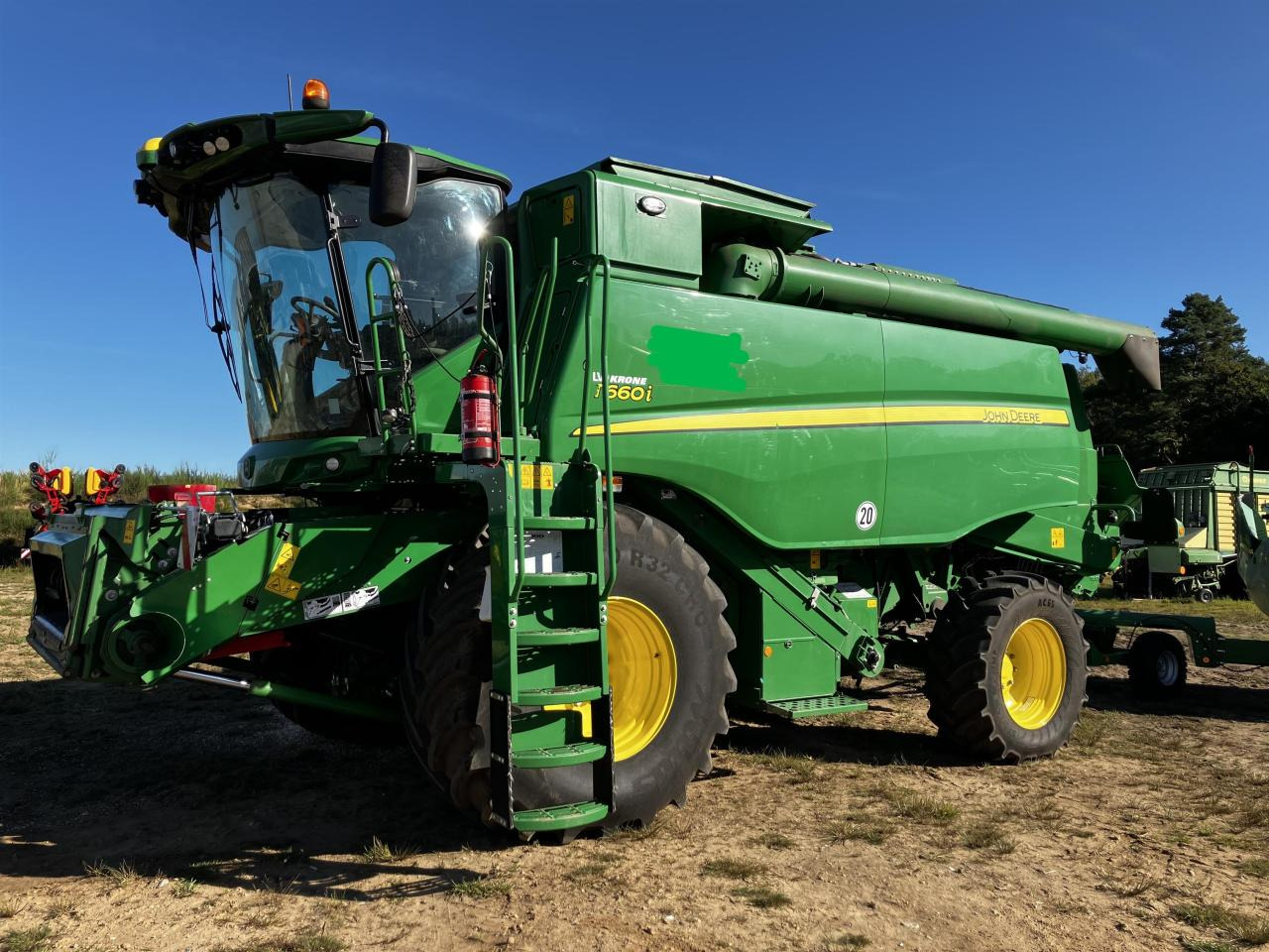 John Deere T660i - Biçerdöver: fotoğraf 1 John Deere T660i - Biçerdöver: fotoğraf 1