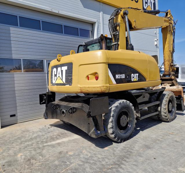 CATERPILLAR M315 - Tekerlekli ekskavatör: fotoğraf 2 CATERPILLAR M315 - Tekerlekli ekskavatör: fotoğraf 2
