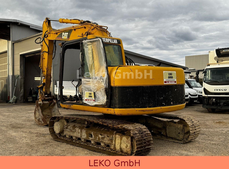 Caterpillar 311C Mit Zwei Löffeln - Paletli ekskavatör: fotoğraf 5 Caterpillar 311C Mit Zwei Löffeln - Paletli ekskavatör: fotoğraf 5