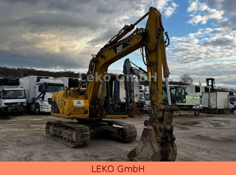 Caterpillar 311C Mit Zwei Löffeln - Paletli ekskavatör: fotoğraf 1 Caterpillar 311C Mit Zwei Löffeln - Paletli ekskavatör: fotoğraf 1