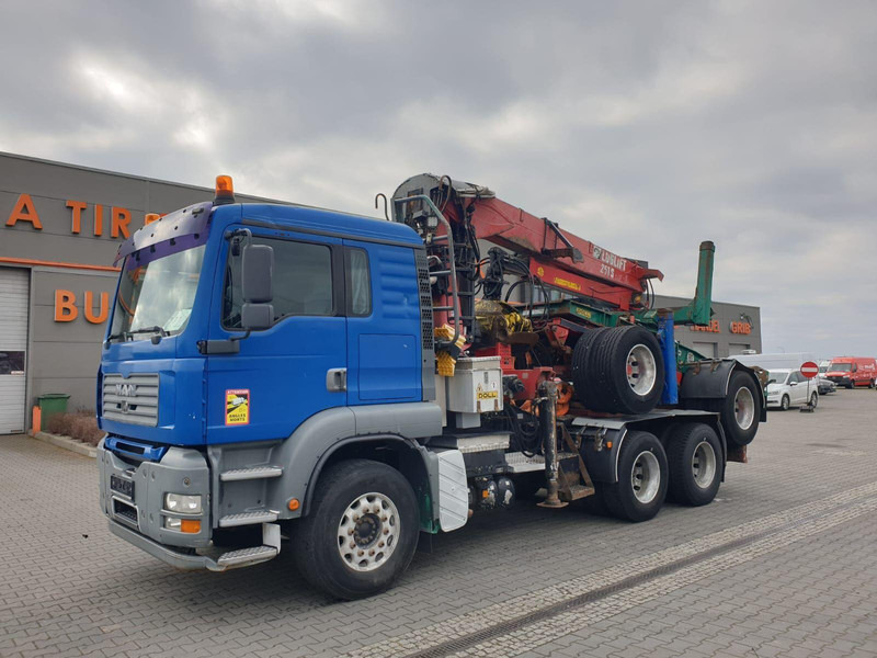 MAN TGA 26.480 6x4 LOGLIFT DOLL WOOD TRANSPORTER - Tomruk kamyonu, Vinçli kamyon: fotoğraf 1 MAN TGA 26.480 6x4 LOGLIFT DOLL WOOD TRANSPORTER - Tomruk kamyonu, Vinçli kamyon: fotoğraf 1