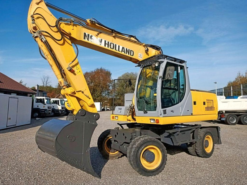 New Holland WE 190 - Tekerlekli ekskavatör: fotoğraf 1 New Holland WE 190 - Tekerlekli ekskavatör: fotoğraf 1