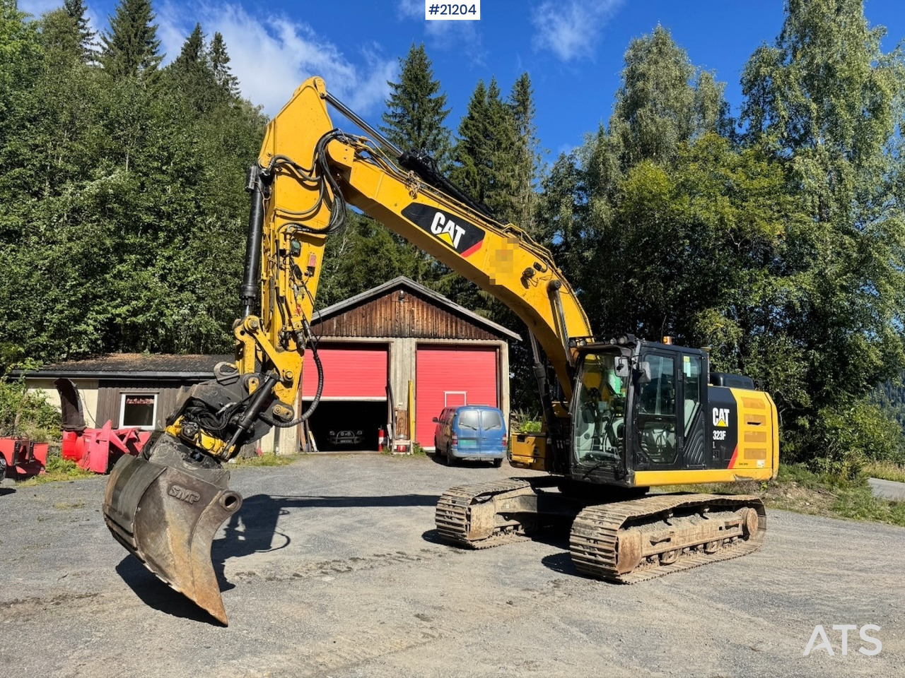 Caterpillar 323FL - Paletli ekskavatör: fotoğraf 1 Caterpillar 323FL - Paletli ekskavatör: fotoğraf 1