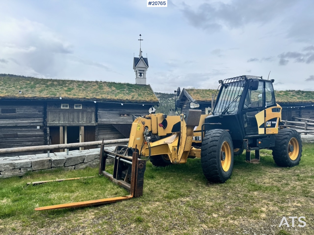 Caterpillar TH360B - Teleskopik yükleyici: fotoğraf 1 Caterpillar TH360B - Teleskopik yükleyici: fotoğraf 1