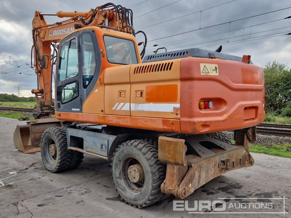 Doosan DX210W - Tekerlekli ekskavatör: fotoğraf 3 Doosan DX210W - Tekerlekli ekskavatör: fotoğraf 3