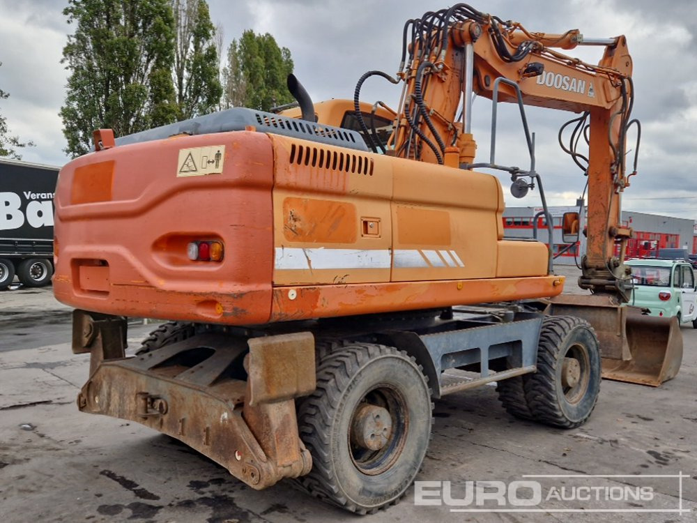 Doosan DX210W - Tekerlekli ekskavatör: fotoğraf 5 Doosan DX210W - Tekerlekli ekskavatör: fotoğraf 5