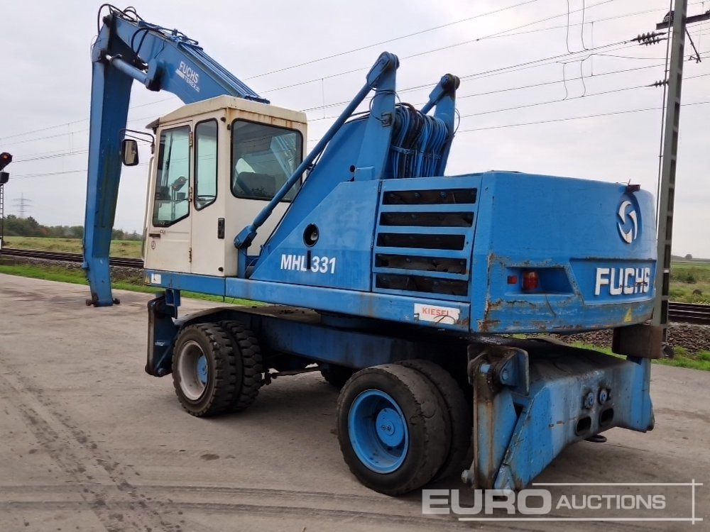 Fuchs MHL331 - Tekerlekli ekskavatör: fotoğraf 3 Fuchs MHL331 - Tekerlekli ekskavatör: fotoğraf 3