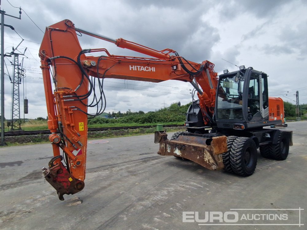 Hitachi ZX190W-3 - Tekerlekli ekskavatör: fotoğraf 1 Hitachi ZX190W-3 - Tekerlekli ekskavatör: fotoğraf 1