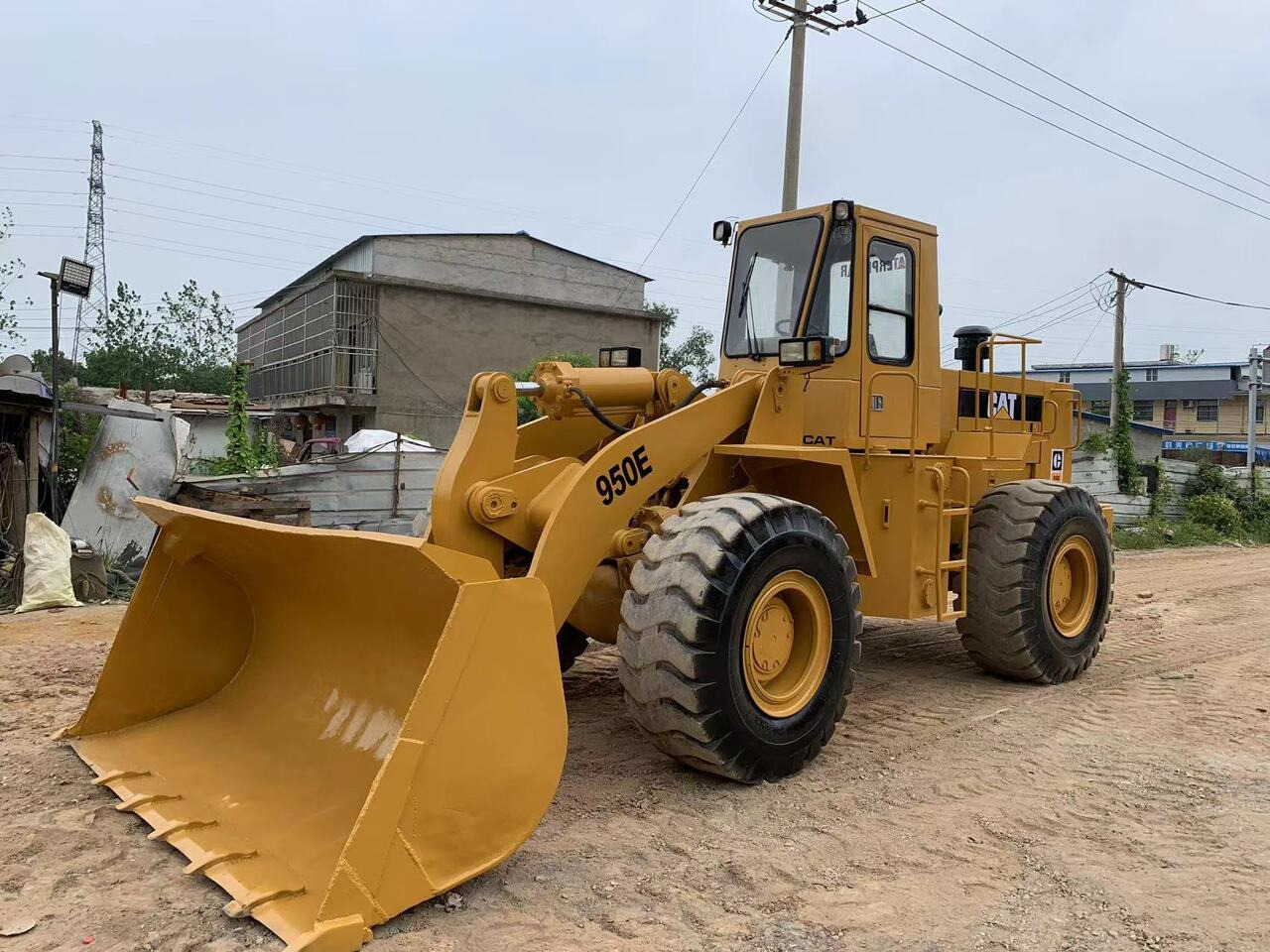 CATERPILLAR 950E - Tekerlekli yükleyici: fotoğraf 1 CATERPILLAR 950E - Tekerlekli yükleyici: fotoğraf 1