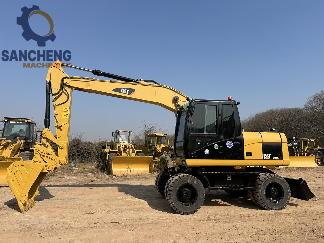 CATERPILLAR M320D2 - Tekerlekli ekskavatör: fotoğraf 2 CATERPILLAR M320D2 - Tekerlekli ekskavatör: fotoğraf 2