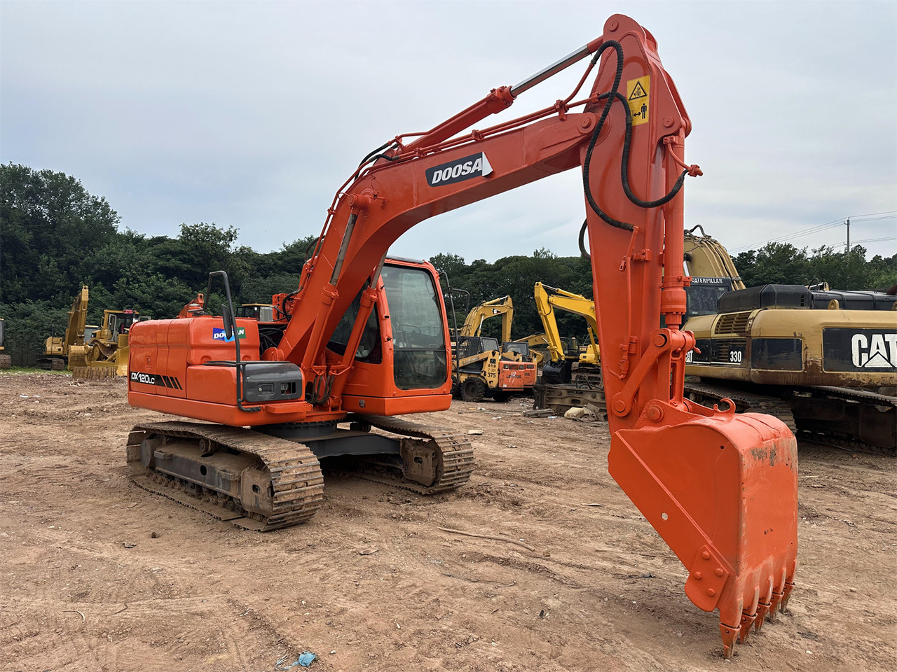 Doosan DX120 - Paletli ekskavatör: fotoğraf 5 Doosan DX120 - Paletli ekskavatör: fotoğraf 5