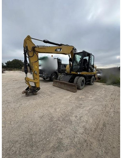 Caterpillar M313D - Ekskavatör: fotoğraf 1 Caterpillar M313D - Ekskavatör: fotoğraf 1