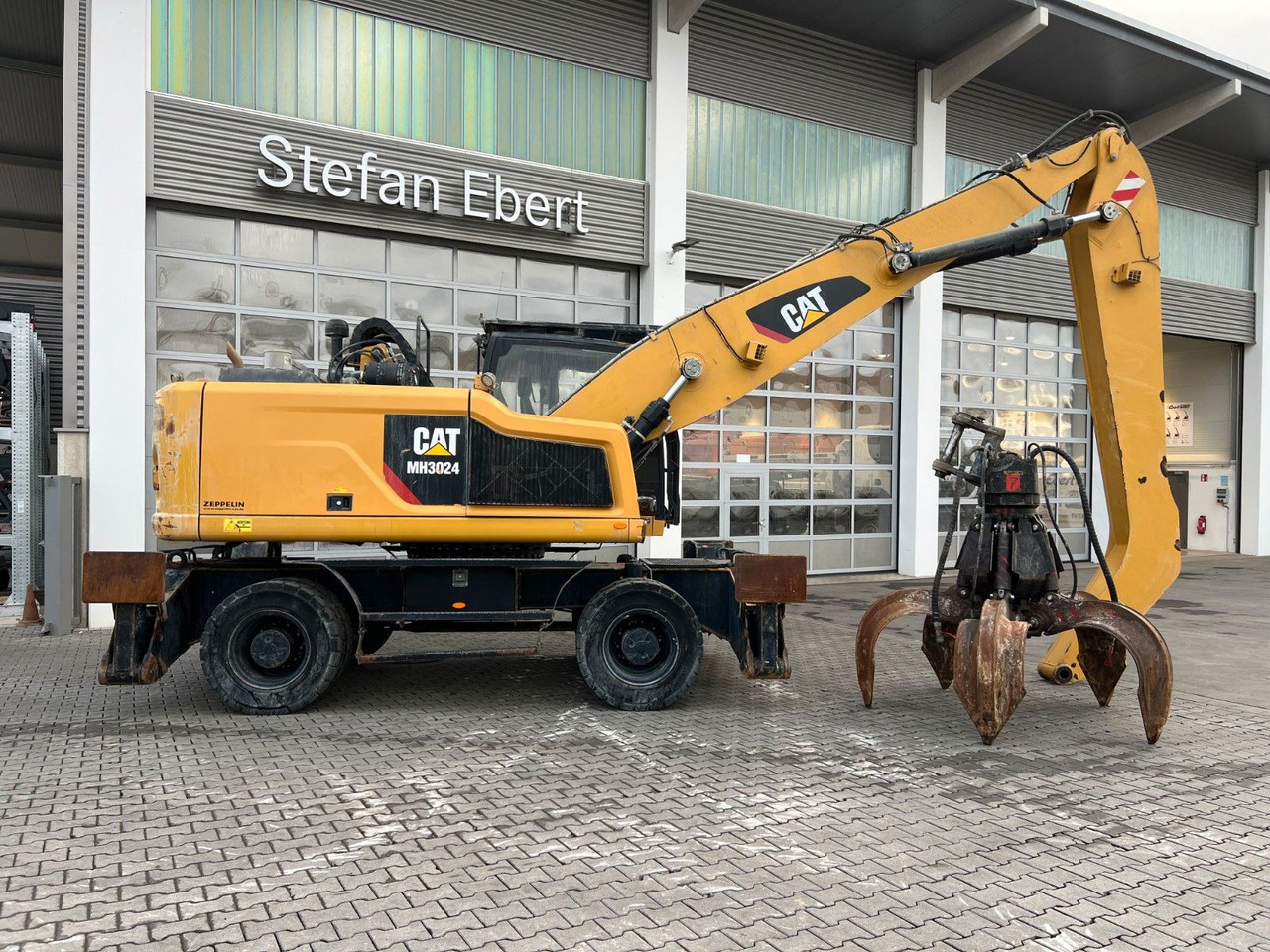 CAT MH3024 / MH 3024 / Greifer / 2018 / 10.735h - Tekerlekli ekskavatör: fotoğraf 3 CAT MH3024 / MH 3024 / Greifer / 2018 / 10.735h - Tekerlekli ekskavatör: fotoğraf 3