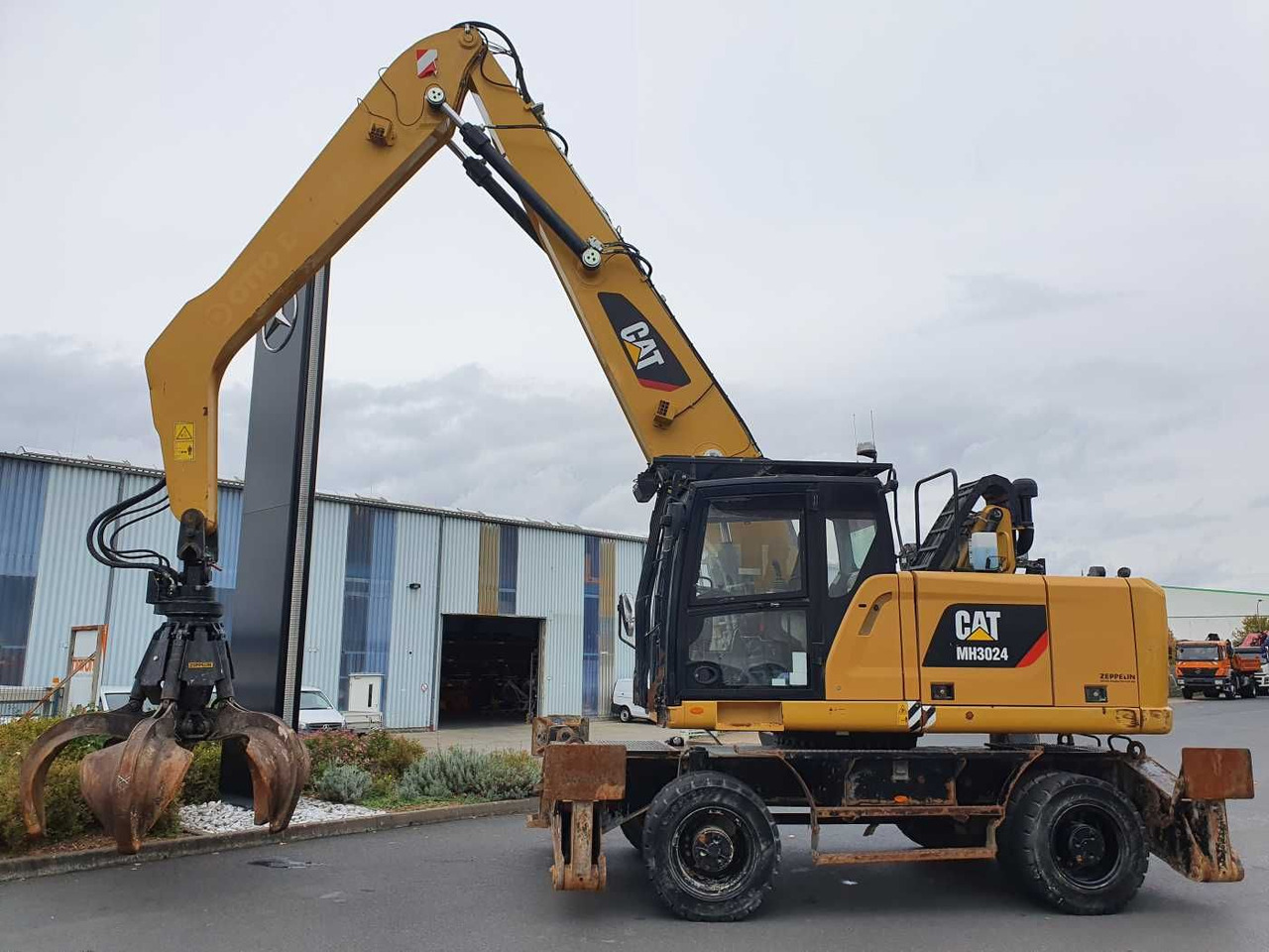 CAT MH3024 / MH 3024 / Greifer / 2018 / 9.424h - Tekerlekli ekskavatör: fotoğraf 3 CAT MH3024 / MH 3024 / Greifer / 2018 / 9.424h - Tekerlekli ekskavatör: fotoğraf 3