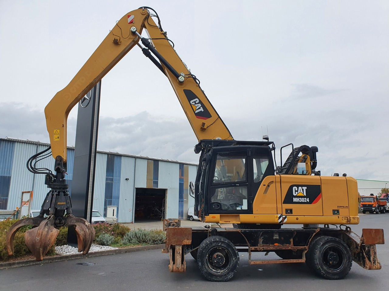 CAT MH3024 / MH 3024 / Greifer / 2018 / 9.424h - Tekerlekli ekskavatör: fotoğraf 3 CAT MH3024 / MH 3024 / Greifer / 2018 / 9.424h - Tekerlekli ekskavatör: fotoğraf 3