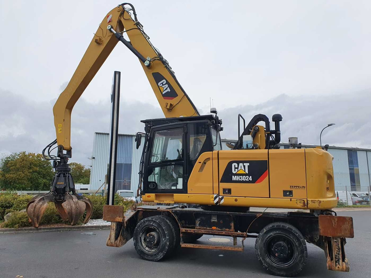 CAT MH3024 / MH 3024 / Greifer / 2018 / 9.424h - Tekerlekli ekskavatör: fotoğraf 4 CAT MH3024 / MH 3024 / Greifer / 2018 / 9.424h - Tekerlekli ekskavatör: fotoğraf 4