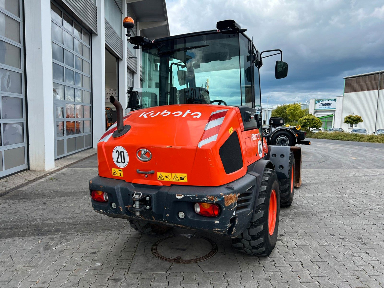 Kubota R070 / Gabel & Schaufel / nur 1.869h! - Tekerlekli yükleyici: fotoğraf 4 Kubota R070 / Gabel & Schaufel / nur 1.869h! - Tekerlekli yükleyici: fotoğraf 4